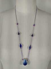 Drop, purple silk string, glass beads